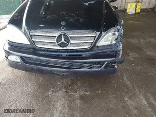 2003 Mercedes-Benz M-Class with VIN 4JGAB75E23A442364, listed as a IAAI auction lot 41958964 with 221,174 mi miles. Bid and sale history available at carsss.com. Image 6.