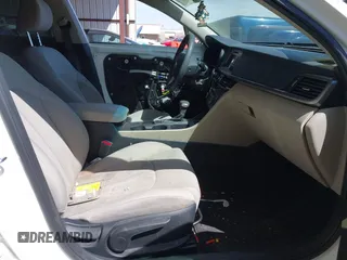 2016 Kia Optima LX with VIN KNAGT4L34G5071506, listed as a IAAI auction lot 41857078 with 72,029 mi miles. Bid and sale history available at carsss.com. Image 5.