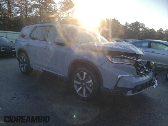 2024 Honda Pilot Touring with VIN 5FNYG1H72RB006807, listed as a Copart auction lot 77688243 with 1,331 mi miles and Salvage Title. Bid and sale history available at carsss.com. Image 4.