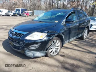2010 Mazda CX-9 Touring with VIN JM3TB3MV1A0200411, listed as a IAAI auction lot 41626755 with 143,844 mi miles and . Bid and sale history available at carsss.com. Image 2.