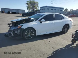 2018 Toyota Camry LE с VIN 4T1B11HK2JU623594, выставлен на аукционе Copart как лот 54921735 с пробегом 110 127 миль миль и Списание • Salvage title. История ставок и продаж доступна на DreamBid. Изображение 1.