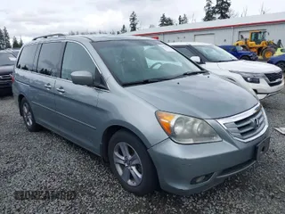 2008 Honda Odyssey Touring with VIN 5FNRL38908B098771, listed as a IAAI auction lot 41878646 with 167,834 mi miles. Bid and sale history available at carsss.com. Image 1.