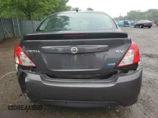 2015 Nissan Versa SV with VIN 3N1CN7AP6FL803252, listed as a Copart auction lot 61076555 with 84,161 mi miles and Salvage title. Bid and sale history available at DreamBid. Image 6.