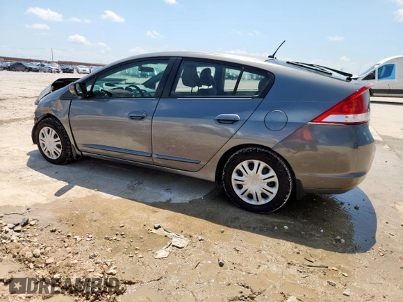 2010 Honda Insight LX with VIN JHMZE2H52AS043392, listed as a Copart auction lot 61347625 with 194,248 mi miles and Salvage title. Bid and sale history available at DreamBid. Image 2.