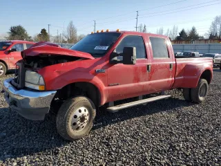 2003 Ford F-350 XL with VIN 1FTWW33FX3EA92736, listed as a Copart auction lot 43202075 with 287,887 mi miles and Salvage Title. Bid and sale history available at DreamBid. Image 1.