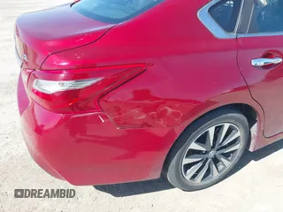 2018 Nissan Altima S with VIN 1N4AL3AP7JC268803, listed as a IAAI auction lot 41755005 with 114,215 mi miles and . Bid and sale history available at DreamBid. Image 6.