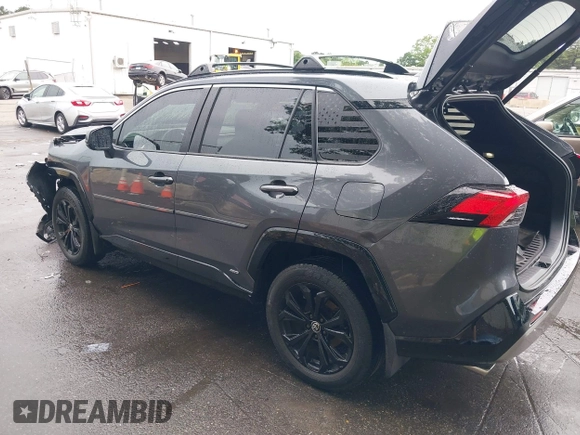 2022 Toyota RAV4 Hybrid SE with VIN JTM16RFV7ND067284, listed as a IAAI auction lot 42637821 with 20,512 mi miles and . Bid and sale history available at DreamBid. Image 3.