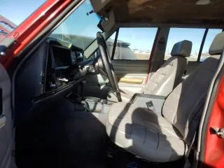 1994 Jeep Cherokee SE with VIN 1J4FJ28S7RL254870, listed as a Copart auction lot 85783884 with 268,569 mi miles and Salvage Title. Bid and sale history available at carsss.com. Image 7.