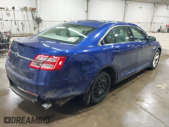 2013 Ford Taurus SEL with VIN 1FAHP2E82DG149828, listed as a IAAI auction lot 41910513 with 130,594 mi miles and . Bid and sale history available at carsss.com. Image 4.