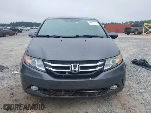 2014 Honda Odyssey Touring with VIN 5FNRL5H98EB008953, listed as a IAAI auction lot 42291179 with Not provided miles and . Bid and sale history available at DreamBid. Image 11.