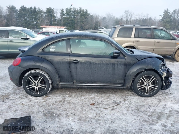 2012 Volkswagen Beetle 2.5L PZEV with VIN 3VWJP7AT8CM619137, listed as a IAAI auction lot 41195954 with 157,741 mi miles. Bid and sale history available at carsss.com. Image 13.