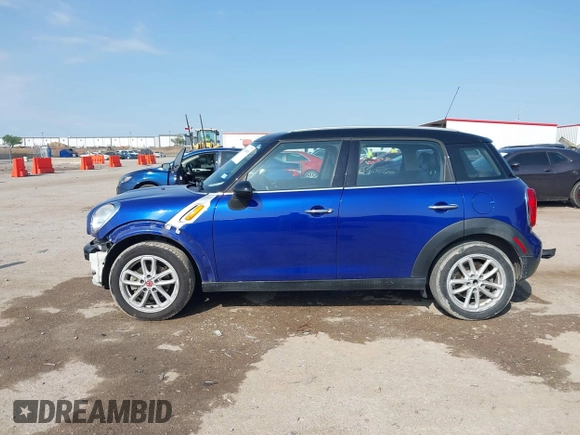2015 MINI Countryman with VIN WMWZB3C56FWR43443, listed as a IAAI auction lot 41920848 with 91,192 mi miles and . Bid and sale history available at DreamBid. Image 15.