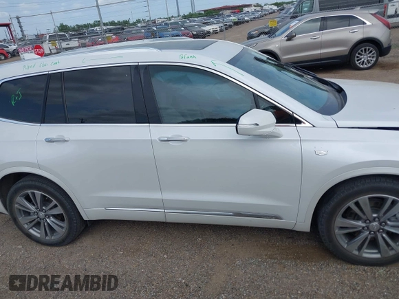 2022 Cadillac XT6 Premium Luxury with VIN 1GYKPCRS2NZ161800, listed as a IAAI auction lot 42174382 with 45,746 mi miles and . Bid and sale history available at DreamBid. Image 13.