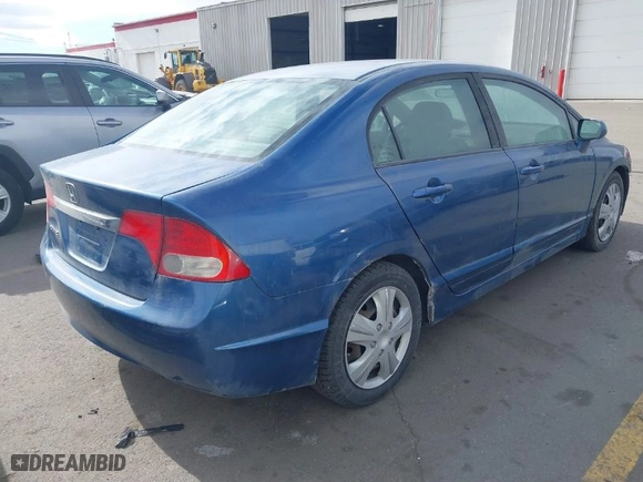 2011 Honda Civic Sdn LX with VIN 19XFA1F57BE011006, listed as a IAAI auction lot 41549448 with 137,781 mi miles. Bid and sale history available at carsss.com. Image 4.