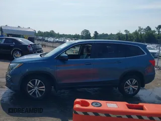 2018 Honda Pilot EX-L with VIN 5FNYF6H52JB050535, listed as a IAAI auction lot 42576721 with 99,280 mi miles and . Bid and sale history available at DreamBid. Image 14.