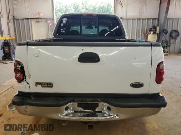 2001 Ford F-150 XLT with VIN 1FTRW07W51KE03221, listed as a Copart auction lot 63628855 with 237,510 mi miles and Salvage title. Bid and sale history available at DreamBid. Image 6.