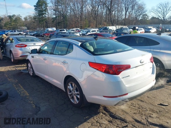 2013 Kia Optima EX with VIN 5XXGN4A79DG199153, listed as a IAAI auction lot 41737349 with 135,000 mi miles. Bid and sale history available at carsss.com. Image 3.