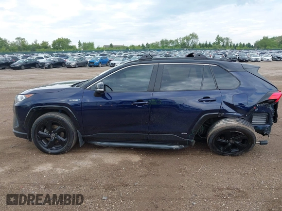 2021 Toyota RAV4 Hybrid XSE with VIN 4T3E6RFV0MU053245, listed as a IAAI auction lot 42426959 with 28,717 mi miles and . Bid and sale history available at DreamBid. Image 14.