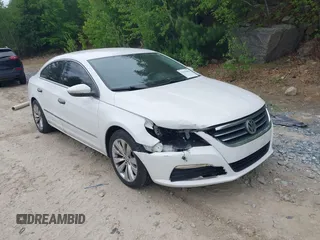 2012 Volkswagen CC Sport z VIN WVWMP7AN9CE544469, wystawiony jako IAAI lot #42290492 z przebiegiem 144 801 mil mil oraz . Historia ofert i sprzedaży dostępna na DreamBid. Obrazek 1.