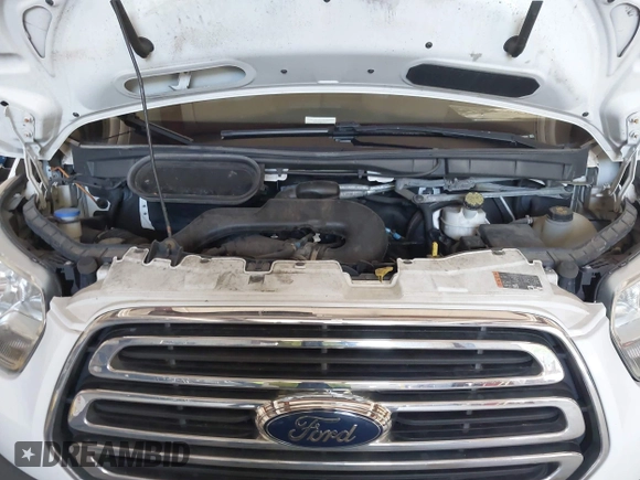 2016 Ford Transit Cargo z VIN 1FTYR2ZM6GKA03946, wystawiony jako IAAI lot #42590477 z przebiegiem 163 710 mil mil oraz . Historia ofert i sprzedaży dostępna na DreamBid. Obrazek 10.