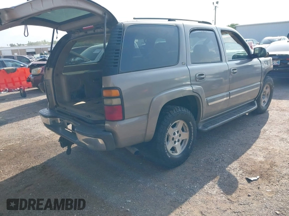 2004 Chevrolet Tahoe LT with VIN 1GNEC13Z34R294550, listed as a IAAI auction lot 42330212 with 298,283 mi miles and . Bid and sale history available at DreamBid. Image 4.