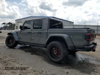 2021 Jeep Gladiator Rubicon с VIN 1C6JJTBG5ML507579, выставлен на аукционе Copart как лот 60409785 с пробегом 62 585 миль миль и Списание • Salvage title. История ставок и продаж доступна на DreamBid. Изображение 2.