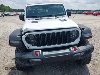 2024 Jeep Gladiator Rubicon z VIN 1C6JJTBG5RL110865, wystawiony jako IAAI lot #42104829 z przebiegiem 6 815 mil mil oraz . Historia ofert i sprzedaży dostępna na DreamBid. Obrazek 6.