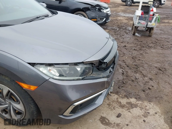 2021 Honda Civic Sedan LX with VIN 2HGFC2F6XMH500937, listed as a IAAI auction lot 41742963 with 39,660 mi miles. Bid and sale history available at carsss.com. Image 6.