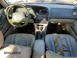1998 Toyota Avalon XL with VIN 4T1BF18B3WU222354, listed as a Copart auction lot 75029214 with 377,315 mi miles and Non Repairable. Bid and sale history available at DreamBid. Image 8.
