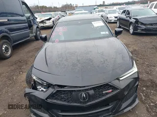 2023 Acura TLX Type S with VIN 19UUB7F97PA004000, listed as a IAAI auction lot 41313294 with 12,000 mi miles and . Bid and sale history available at DreamBid. Image 12.