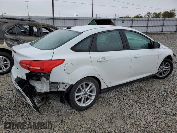 2016 Ford Focus SE with VIN 1FADP3F20GL346345, listed as a Copart auction lot 77115253 with 91,588 mi miles and Salvage Title. Bid and sale history available at DreamBid. Image 3.
