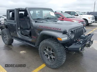 2018 Jeep Wrangler Unlimited Rubicon with VIN 1C4HJXFG4JW126387, listed as a IAAI auction lot 42353964 with 82,565 mi miles and . Bid and sale history available at DreamBid. Image 1.