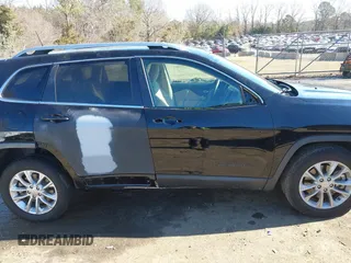 2019 Jeep Cherokee Latitude z VIN 1C4PJLCX3KD353480, wystawiony jako IAAI lot #41305389 z przebiegiem 88 326 mil mil oraz . Historia ofert i sprzedaży dostępna na DreamBid. Obrazek 14.