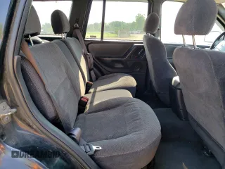 2000 Jeep Grand Cherokee Laredo with VIN 1J4GW48S6YC404063, listed as a Copart auction lot 59442725 with 268,543 mi miles and Salvage title. Bid and sale history available at DreamBid. Image 11.