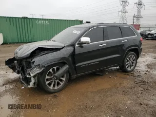 2017 Jeep Grand Cherokee Overland z VIN 1C4RJFCG2HC694278, wystawiony jako Copart lot #49276055 z przebiegiem 75 474 mil mil oraz Szkody całkowita. Historia ofert i sprzedaży dostępna na DreamBid. Obrazek 1.