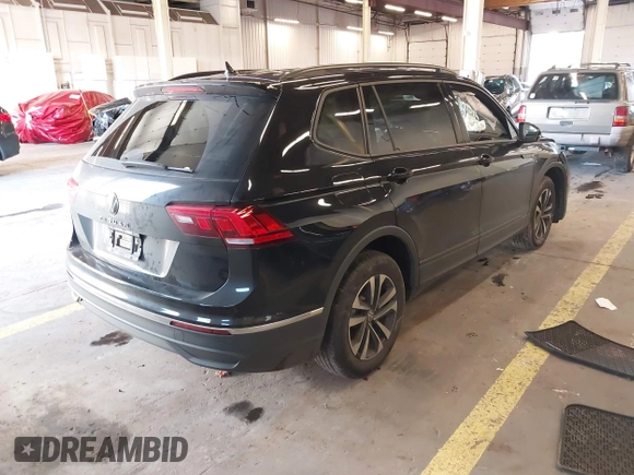 2023 Volkswagen Tiguan S z VIN 3VVRB7AX6PM069001, wystawiony jako IAAI lot #41193316 z przebiegiem 21 586 mil mil oraz . Historia ofert i sprzedaży dostępna na DreamBid. Obrazek 4.