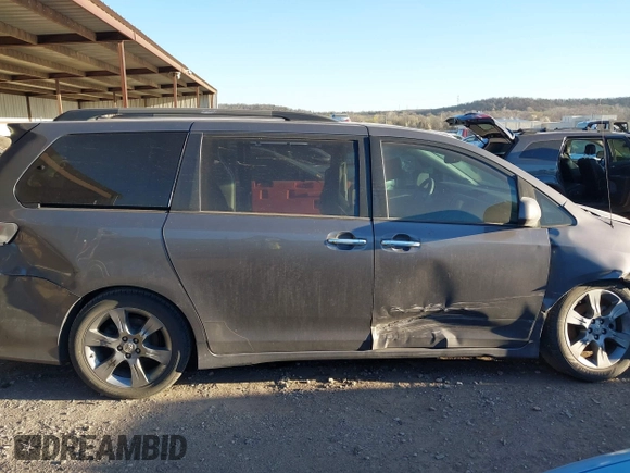 2014 Toyota Sienna SE with VIN 5TDXK3DC1ES462473, listed as a IAAI auction lot 41811437 with 209,704 mi miles and . Bid and sale history available at DreamBid. Image 13.