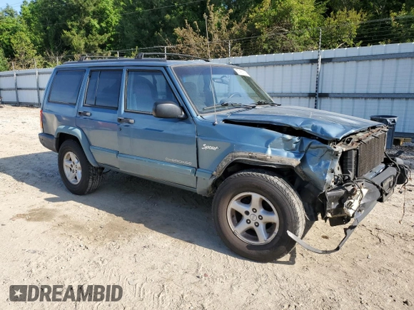 1998 Jeep Cherokee Sport with VIN 1J4FJ68S6WL283022, listed as a Copart auction lot 57451125 with 207,618 mi miles and Salvage title. Bid and sale history available at DreamBid. Image 4.