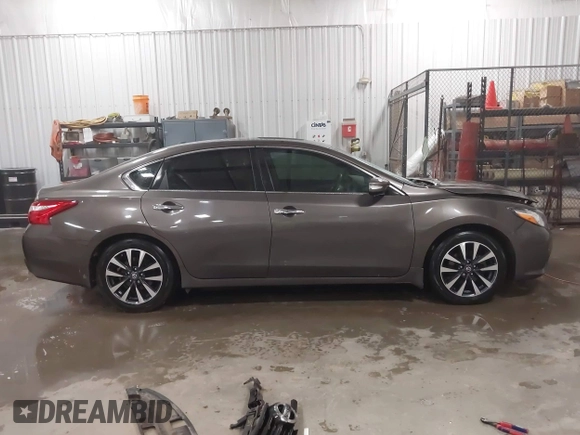 2016 Nissan Altima 2.5 S with VIN 1N4AL3AP4GC145811, listed as a IAAI auction lot 41424415 with 124,224 mi miles. Bid and sale history available at carsss.com. Image 14.