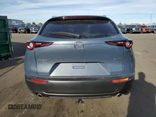 2023 Mazda CX-30 S Carbon Edition z VIN 3MVDMBCM5PM512410, wystawiony jako Copart lot #83490034 z przebiegiem 23 783 mil mil oraz Nie do naprawy • Non repairable. Historia ofert i sprzedaży dostępna na DreamBid. Obrazek 6.