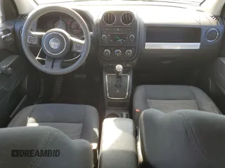 2016 Jeep Compass Sport SE with VIN 1C4NJDBBXGD523537, listed as a Copart auction lot 87664995 with 132,010 mi miles and Salvage title. Bid and sale history available at DreamBid. Image 8.