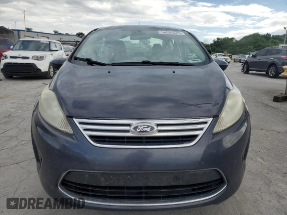 2012 Ford Fiesta SE z VIN 3FADP4BJ8CM194262, wystawiony jako Copart lot #56685845 z przebiegiem 367 579 mil mil oraz Szkoda całkowita • Salvage title. Historia ofert i sprzedaży dostępna na DreamBid. Obrazek 5.