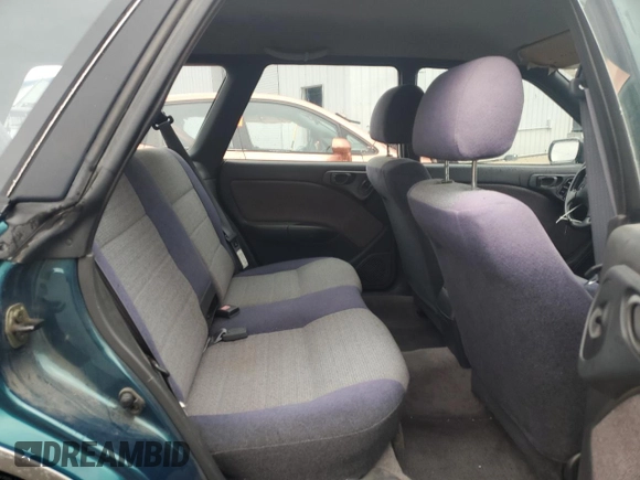 1996 Subaru Legacy Outback with VIN 4S3BG685XT7984194, listed as a Copart auction lot 77999224 with 130,804 mi miles and Salvage title. Bid and sale history available at DreamBid. Image 11.