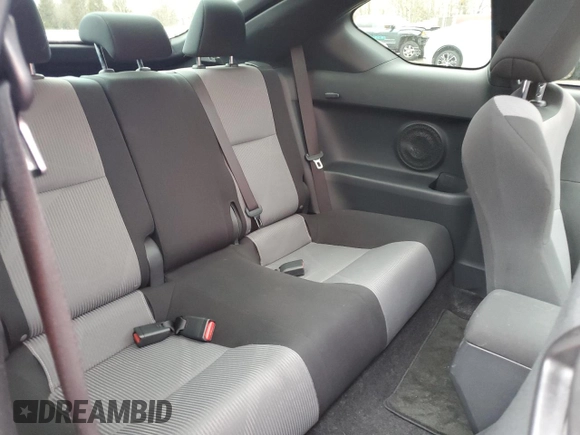 2014 Scion tC z VIN JTKJF5C77E3075236, wystawiony jako Copart lot #47632495 z przebiegiem 134 825 mil mil oraz Szkody całkowita. Historia ofert i sprzedaży dostępna na DreamBid. Obrazek 10.
