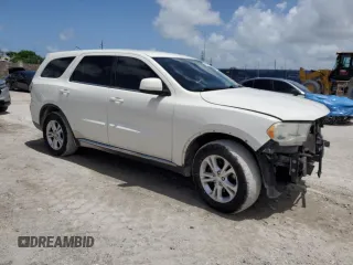 2012 Dodge Durango SXT z VIN 1C4RDHAG0CC329788, wystawiony jako Copart lot #61101745 z przebiegiem 208 302 mil mil oraz Szkoda całkowita • Salvage title. Historia ofert i sprzedaży dostępna na DreamBid. Obrazek 4.