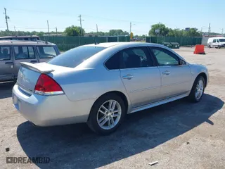 2013 Chevrolet Impala LTZ with VIN 2G1WC5E30D1266641, listed as a IAAI auction lot 39649556 with 148,380 mi miles. Bid and sale history available at carsss.com. Image 4.
