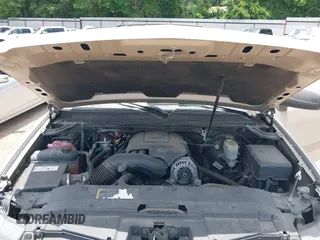 2007 Chevrolet Tahoe LT z VIN 1GNFC130X7R353412, wystawiony jako IAAI lot #42535108 z przebiegiem 78 497 mil mil oraz . Historia ofert i sprzedaży dostępna na DreamBid. Obrazek 10.