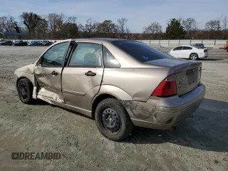 2005 Ford Focus S with VIN 1FAFP34N35W141023, listed as a Copart auction lot 84230574 with 244,545 mi miles and Salvage Title. Bid and sale history available at carsss.com. Image 2.