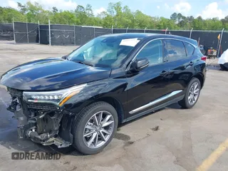 2020 Acura RDX w/Technology Pkg with VIN 5J8TC1H57LL002097, listed as a IAAI auction lot 41957752 with 60,945 mi miles. Bid and sale history available at carsss.com. Image 2.
