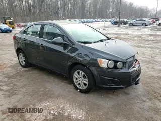 2014 Chevrolet Sonic LT with VIN 1G1JC5SH4E4239958, listed as a Copart auction lot 46082295 with 128,275 mi miles and Salvage Title. Bid and sale history available at DreamBid. Image 13.